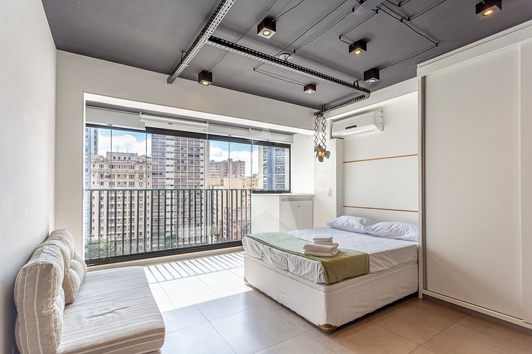 Studio Aurora perto de tudo com A/C + garagem