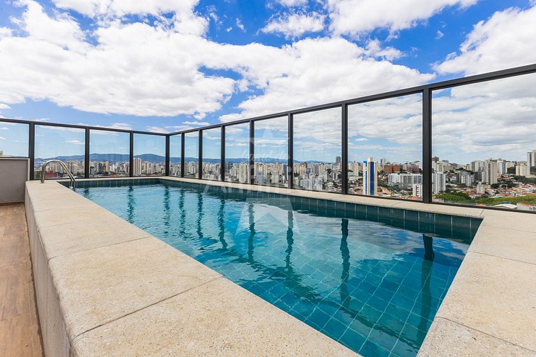 Studio TV de 60" a 5 min metrô com piscina e A/C